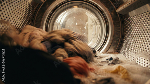 Inside a Front Loading Washing Machine During a Laundry Cycle