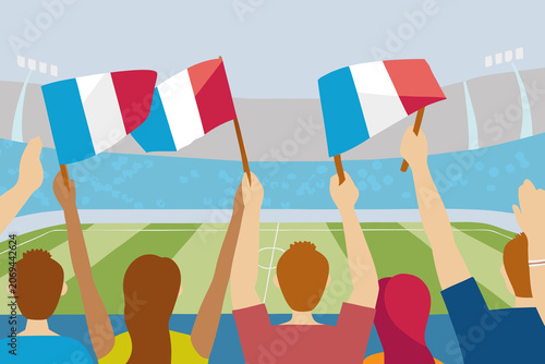 Fans wave France flags at soccer match in stadium as excitement fills the air during a lively sporting event