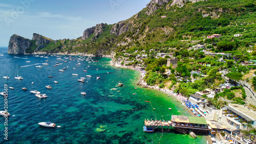 Fotografie High altitude aerial shot of Marina del Cantone seaside and Amalfi coast cliffs