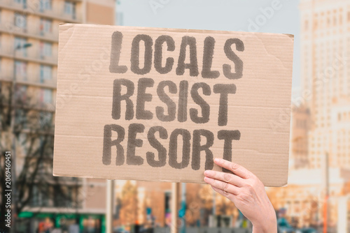 Bilde på lerret "Locals resist resort" Residents oppose new tourist development