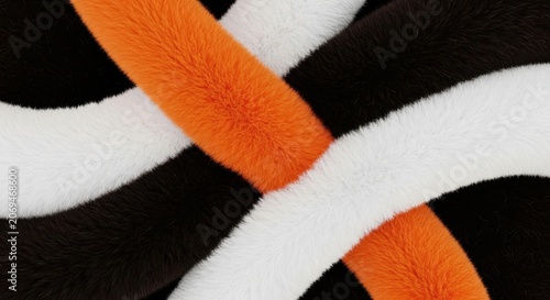 Closeup of soft fuzzy fabric with orange white and black curved stripes texture