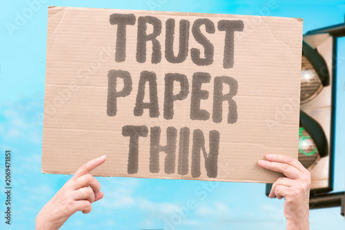 фотографія "Trust paper thin" Confidence extremely weak and superficial