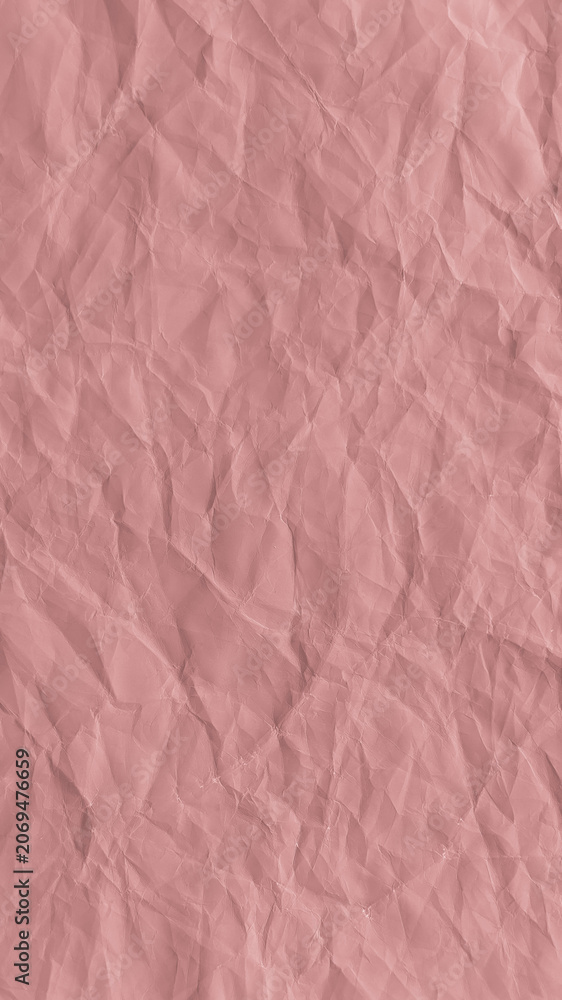 Fototapeta premium Textured pink crumpled paper wallpaper for mobile