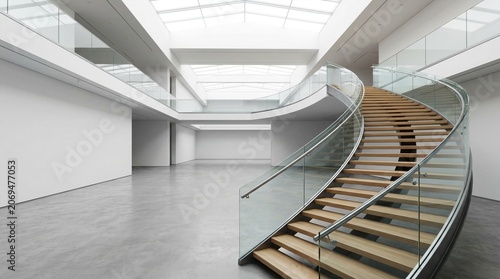 Modern architectural interior with a grand curved wooden staircase and glass railings under a natural skylight atrium