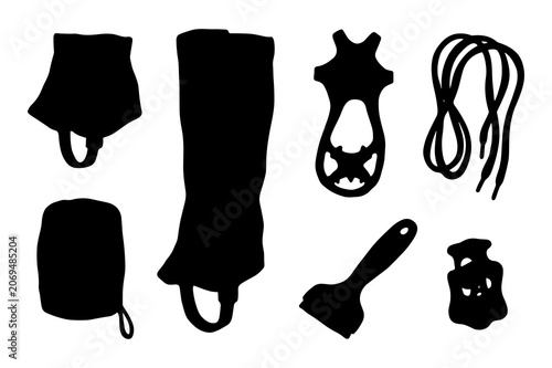 Collection of silhouettes of outdoor equipment and tools on white background.
