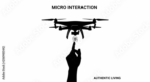 Silhouette of a hand reaching to control a drone with a glowing touchscreen interface.