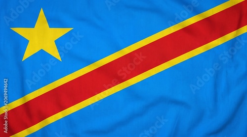 Congolese flag waving proudly, symbolizing hope, unity, and strength through star and diagonal stripe design…