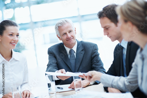 Konstfotografi Corporate, meeting and business people in office with documents, manager and handover for budget review