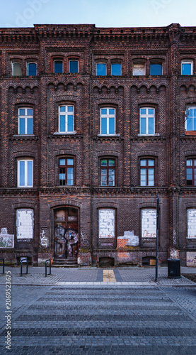 Cuadro en lienzo the front facade of derelict former factory buildings