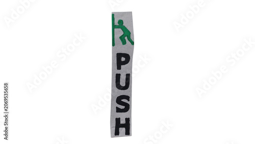 Green push button sign with hand icon on gray metallic panel