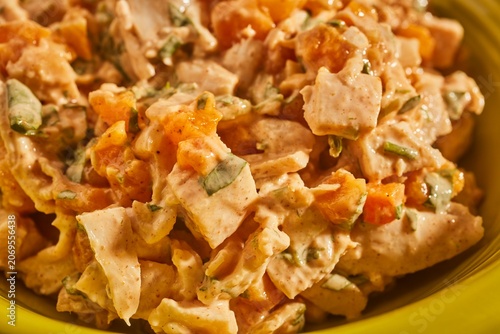A bowl of Coronation Chicken. The classic British salad.