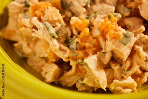 A bowl of Coronation Chicken. The classic British salad.