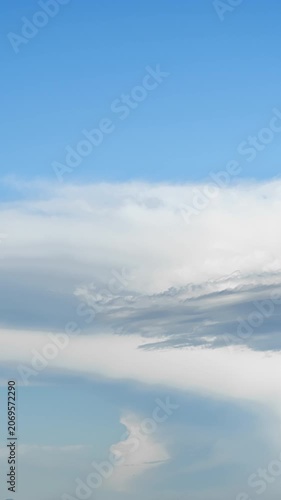 Beautiful and atmospheric aerial video of the sky, clouds rolling and unfolding, and natural ecological landscape.