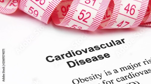 Cardiovascular Disease Risk Concept with Measuring Tape and Health Document