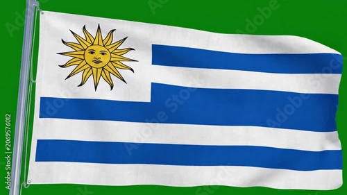 Waving flag of uruguay against a green background