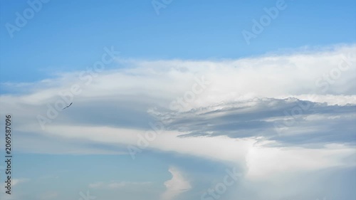Beautiful and atmospheric aerial video of the sky, clouds rolling and unfolding, and natural ecological landscape.