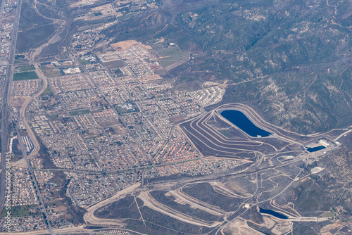 Aerial view of the Devil Canyon Power Plant and afterbay, part of California State Water Project, with the University Heights and Verdemont neighborhoods of San Bernardino visible below Devils Canyon