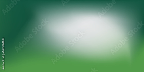 Abstract blurred gradient mesh background in green.
