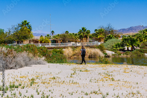 Konstfotografi Female Hiker and Varner Bay  and Salton Sea Visitor Center at The Salton Sea Sta
