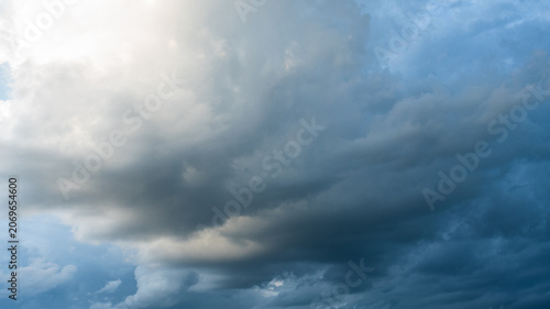 Εκτύπωση καμβά Dark rain cloud dramatic sky summer tropical thunder storm sky and fluffy black darkness cloud nearly raining cloudscape