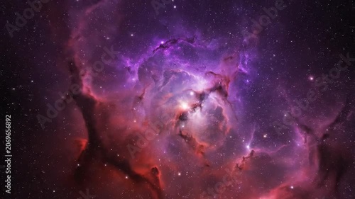 Stunning purple and red nebula clouds glow in deep outer space