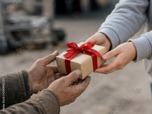 A Generous Gift Being Given to a Homeless Person in Need
