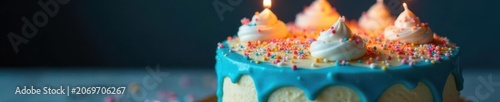 Classic vanilla cake, lit candle, blue drip, vibrant sprinkles , sweettreat, foodstyling, baking
