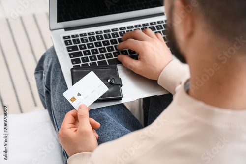 Man with wallet and credit ...