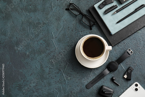 Cup of coffee with mobile p...