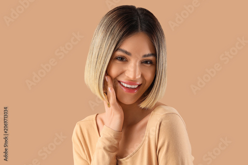 Stylish young woman with sh...