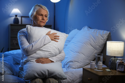 Senior woman suffering from...