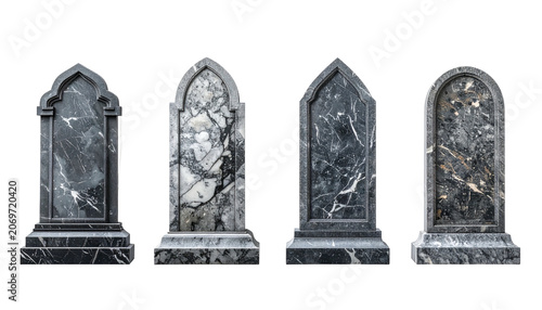 Four dark, marble tombstones, each with a unique gothic shape