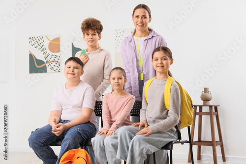 Female guide with children ...