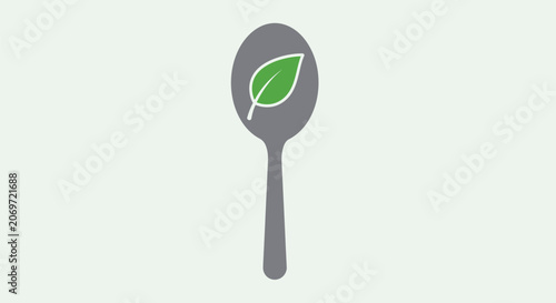 Minimalist graphic icon of a grey spoon with a green leaf symbol representing healthy and organic food.