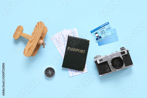 Composition with passport, tickets, photo camera, driving license and credit ...