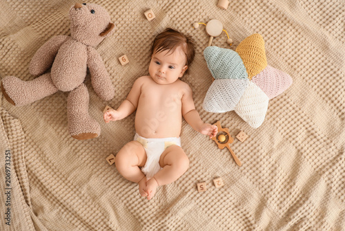 Cute little baby with toys ...