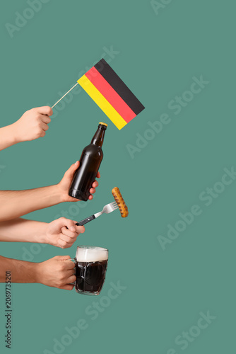Male hands with bottle of c...