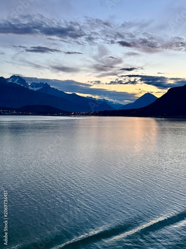 Alaska mountains and water dusk views from a cruise ship