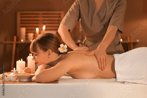 Young woman undergoing mass...