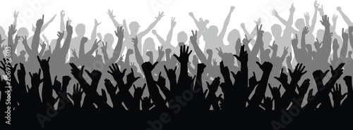 Obraz na płótnie Silhouette of a large, dense crowd of people with their hands raised in celebrat