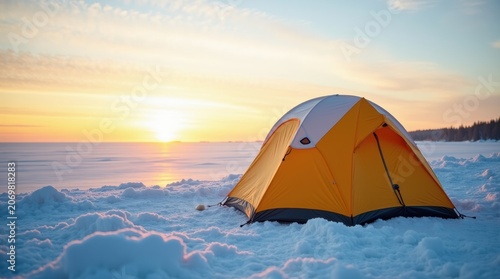 Winter camping, orange tent, snowy landscape, sunrise