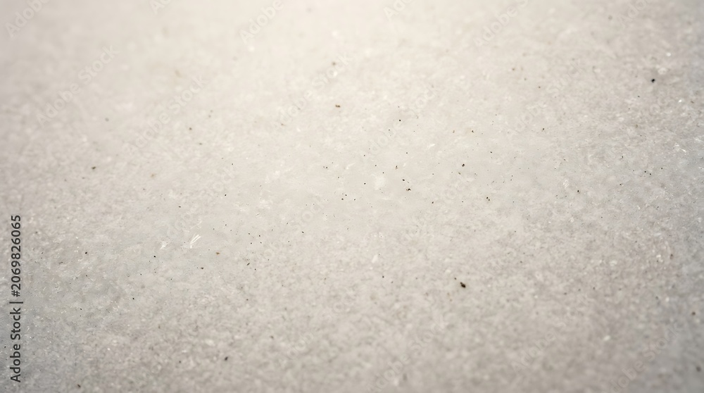 Fototapeta premium White sand texture with small black specks