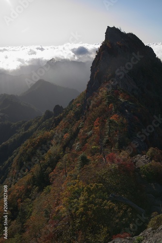 Rocky mountain spire in autumn in Japan