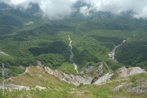 Green alpine valley and ridges in early summer, Japan