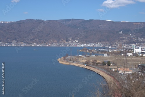 Coastal city and bay from above in winter, Japan