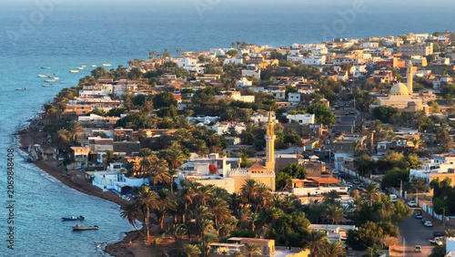 Obraz na plátne Aerial View of Dahab Waterfront Town with Mosque and Red Sea