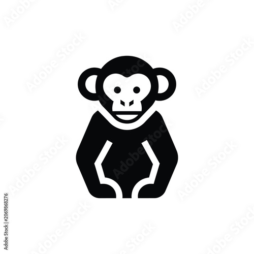 Canvas Print Simple black silhouette of a seated monkey in front view, featuring large ears a