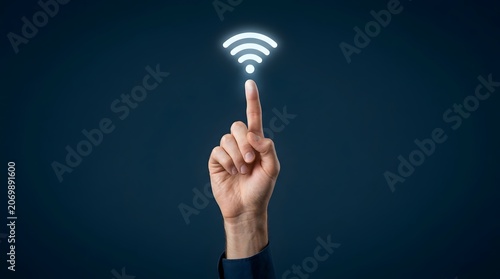 Wireless wifi connection icon glowing above pointing finger, digital network technology concept, hand touching virtual internet signal symbol