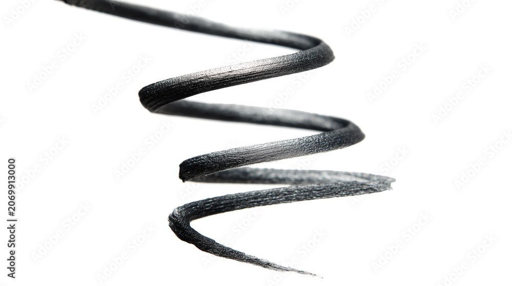 Naklejka premium Black cosmetic smear showcasing rich texture on white surface