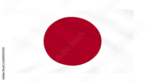 A close-up view of the Japanese flag, showing its iconic red sun on a white background.